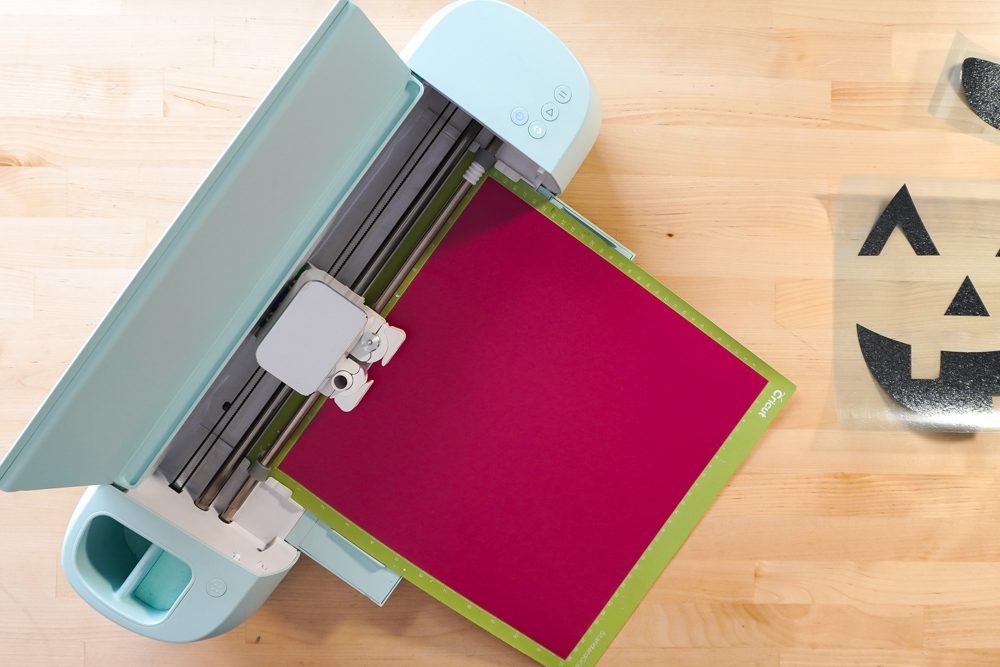 Cricut cutting pink HTV
